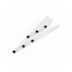 Foldable ruler for determining the symmetry of eyebrows.